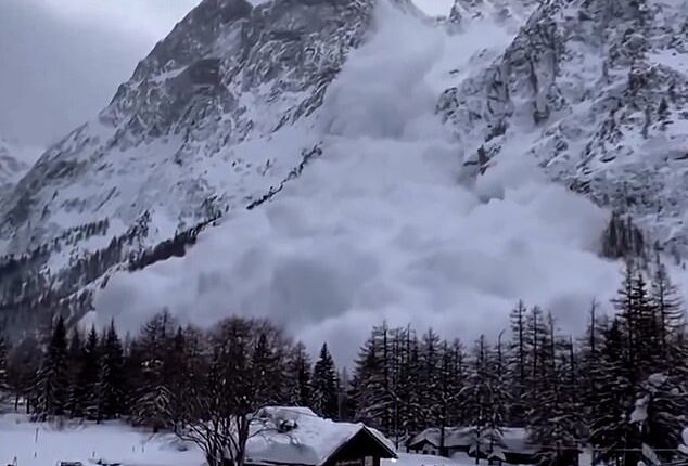 This is the moment a huge avalanche cascaded down a mountainside engulfing dozens of skiers below