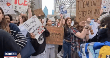students with protest signs