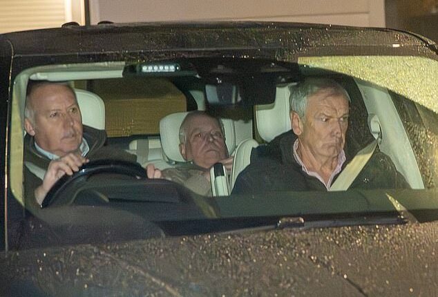 Andrew Mountbatten-Windsor as he left Aylsham police station could be seen slouching in the back of his vehicle