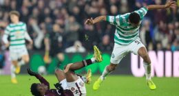 Celtic defender Auston Trusty collides with Hearts striker Pierre Landry Kabore
