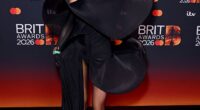 Olivia Attwood turned heads on the BRIT Awards red carpet on Saturday as she arrived to the ceremony in a black asymmetrical gown