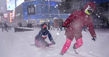 Over 600,000 without power as powerful bomb cyclone dumps up to 30 inches of snow across parts of the East Coast