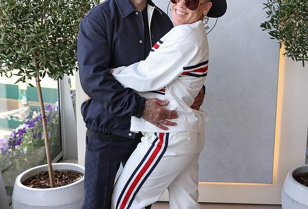 Pink has broken her silence on claims she has split from husband of 20 years, Caeey Hart (seen in 2024)