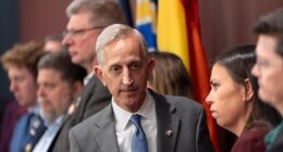 Keith Wilson (pictured center), the mayor of Portland, Oregon told Immigration and Customs Enforcement (ICE) agents to 'resign' and leave the city after he claimed peaceful protesters were tear gassed