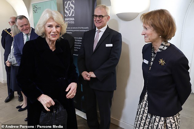 Queen Camilla appeared at Westminster today as she visited young scholars from the Ri-Borough Music Hub's rehearsal
