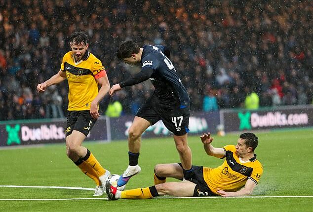 Winger Mikey Moore goes down after a challenge by Cammy Kerr that went unpunished