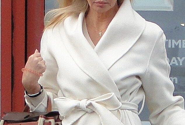 Real Housewives of London star Amanda Cronin was banned from the roads today (Pictured: Ms Cronin leaving Bromley Magistrates' Court on Friday)