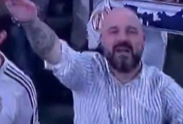 A Real Madrid fan is under investigation after he appeared to perform a Nazi salute