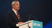 Nigel Farage speaks during a rally for Reform UK at the NEC Birmingham yesterday