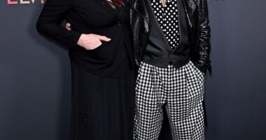 Rod Stewart and his wife Penny Lancaster put on a loved-up display as they attended the EPIC: Elvis Presley In Concert UK premiere