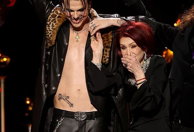 Sharon Osbourne broke down in tears as she took to the stage during the 2026 GrammyAwards in Los Angeles on Sunday evening (pictured with Yungblud)