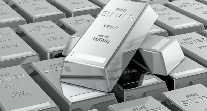 Silver falls as much as 13% as the volatility continues in metals