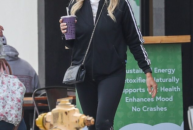 Singer divorcing Bones producer husband after he was named in the Epstein files looks devastated on first public outing