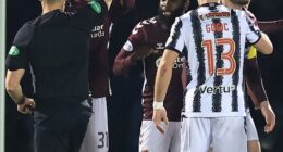 Craig Halkett is shown a straight red card as Hearts were reduced to ten men yet again