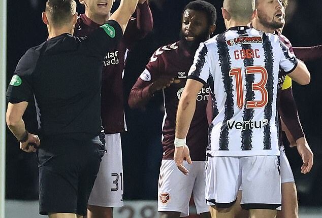 Craig Halkett is shown a straight red card as Hearts were reduced to ten men yet again