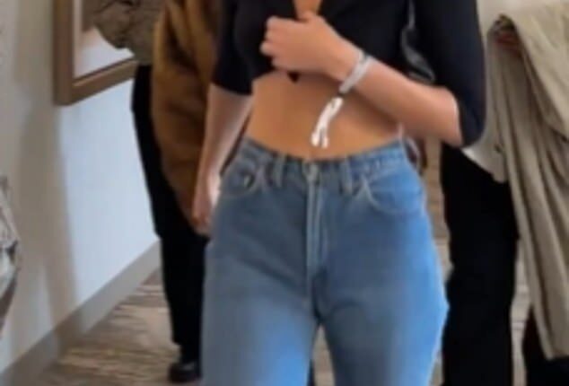 Not in the Super Bowl spirit! Kendall Jenner arrived to the big game in a black crop top that showed off her entire midsection. She completed her look with a pair of high-waisted blue jeans and black sunglasses