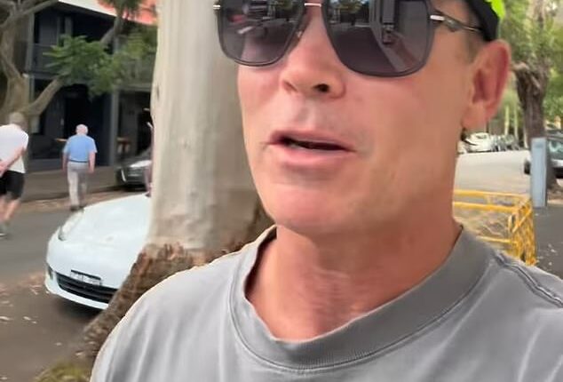 Sydney father, Justin Lewis (pictured), has issued an urgent warning to Aussie parents after recalling the moment he caught a stranger appearing to film his 13-year-old son in public