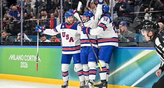 Dylan Larkin of United States celebrates his goal with Tage Thompson and Jaccob Slavin