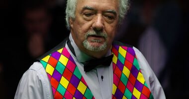 Snooker legend and TV favourite John Virgo, pictured during an exhibition match at the Crucible in Sheffield in May 2015, has died at the age of 79