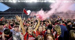 As young Cork fans celebrated, one held up a flare that belched red smoke into the night.