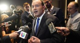 Utah Republican Mike Lee speaks to reporters in 2022 in Salt Lake City