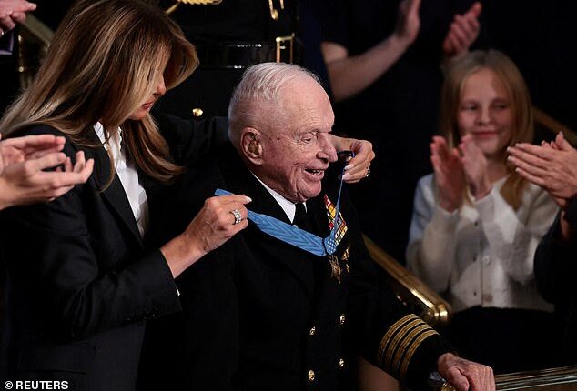 Royce Williams, a 100-year-old Navy aviator and Korean War veteran, is given the Congressional Medal of Honor by U.S. First lady Melania Trump