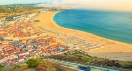 Portugal's authentic villages and well-preserved beaches, such as that of the surfing town of Nazare (pictured), lend a gentler appeal than next-door Spain