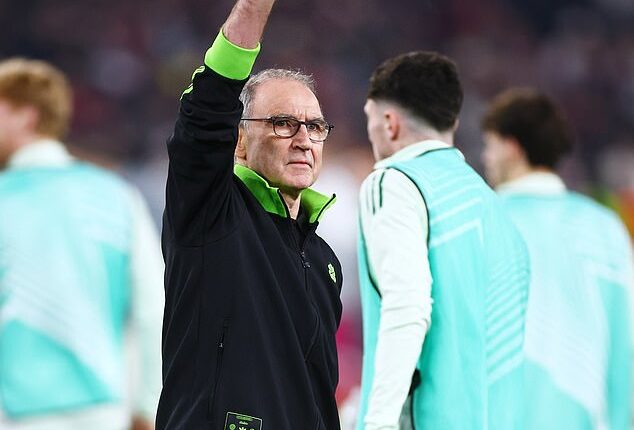 Martin O'Neill salutes the away fans after his Celtic side won 1-0 away to Stuttgart