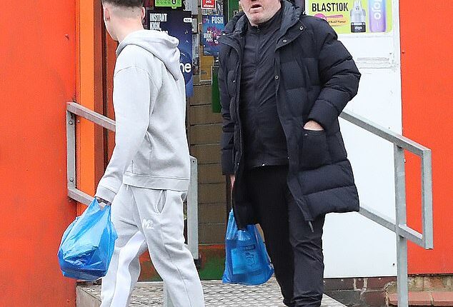 Wayne Rooney was spotted out and about with his eldest son Kai on Wednesday after the teen footballer was said to be offered a deal with his father's old team