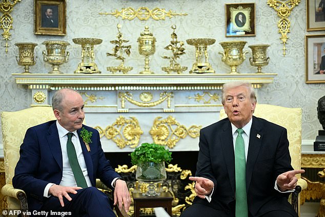 Donald Trump with Ireland's Taoiseach Micheal Martin on Tuesday. The President has said he is 'not afraid' of anything, even sending ground troops to Iran in a Vietnam War-style invasion