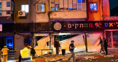 Air raid sirens blare in Israel and rescue and salvage teams deployed after deadly Iranian missile strikes