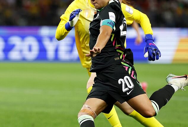 Sam Kerr is pictured a split second before the strike that propelled the Matildas into the final of the Asian Cup