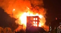 Flames appeared to decimate the interior of the seven-storey building on Mill Street, with fire crews rushing to the scene to try tackle the blaze