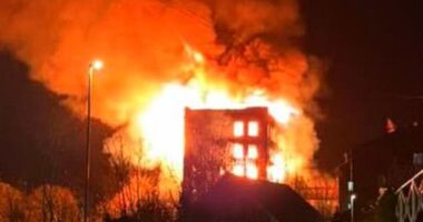 Flames appeared to decimate the interior of the seven-storey building on Mill Street, with fire crews rushing to the scene to try tackle the blaze