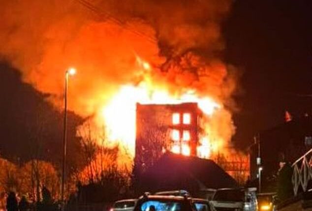 Flames appeared to decimate the interior of the seven-storey building on Mill Street, with fire crews rushing to the scene to try tackle the blaze