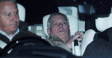 Andrew Mountbatten Windsor, younger brother of Britain's King Charles, formerly known as Prince Andrew, leaves Aylsham Police Station on a vehicle, on the day he was arrested on suspicion of misconduct in public office