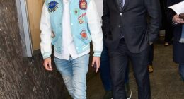 Declyn 'Dex' Lauper rocked up to court in Manhattan on Friday in skinny jeans, dress shoes, a button down and a varsity jacket as he pleaded guilty to criminal possession of a weapon