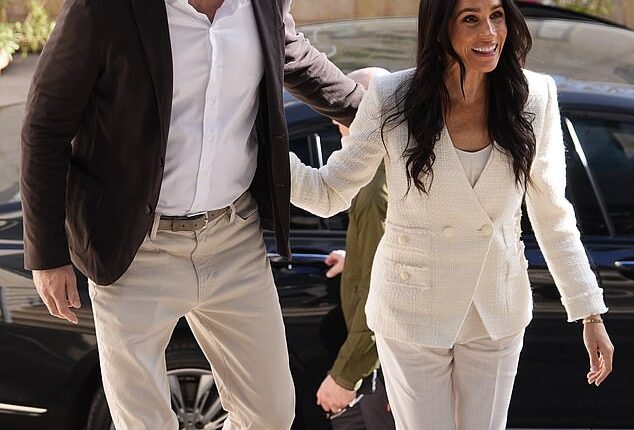 Pictured: Prince Harry and Meghan during their visit to Jordan last February