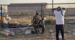 Footage on social media shows a group of men approaching the pilot and shouting, while one of them brandishes a metal pipe