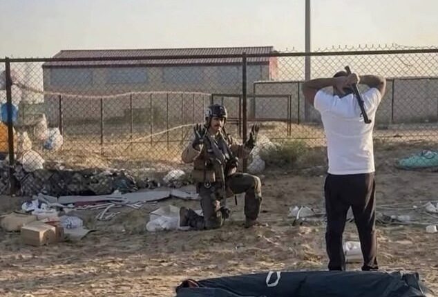 Footage on social media shows a group of men approaching the pilot and shouting, while one of them brandishes a metal pipe