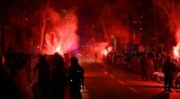 Riot police lined up outside the Nou Camp as raucous Barcelona fans gathered on Tuesday