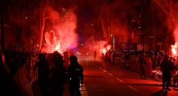 Riot police lined up outside the Nou Camp as raucous Barcelona fans gathered on Tuesday