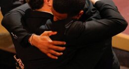 Michael B. Jordan enjoyed tight embrace from Leonardo DiCaprio after beating him for best actor - more than a decade on from DiCaprio's 2015 win in the same category for The Revenant