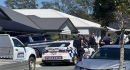 Two crime scenes have been set up after a woman and baby were found dead at a home near Logan