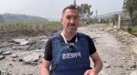 British journalist Steve Sweeney is seen moments before a missile struck the ground just feet behind him in southern Lebanon