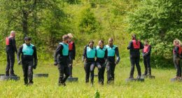 Pictured: Ten players are divided into two groups, and let loose in woodland. The ones in blue tabards are the Prey, and they have to avoid capture, while the Predators in red have to catch them