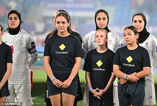 The Iranian women's football team were branded 'wartime traitors' after they refused to sing Iran's national anthem on Monday before the Asian Cup opener (pictured)
