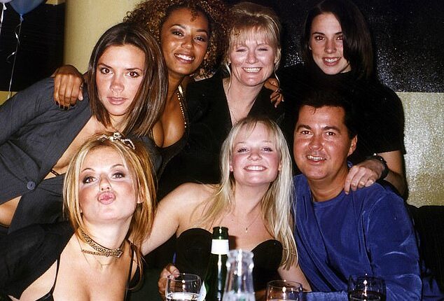 The Spice Girls with their manager Simon Fuller, and Emma Bunton’s mother, Pauline, in 1997