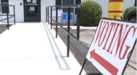 A voting sign in front of a polling station as early voting continues in Virginia's April referendum.