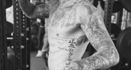 Sir David Beckham showed off his ripped physique and tattoos as he worked out shirtless in his lavish home gym at his £60million Miami mansion on Tuesday